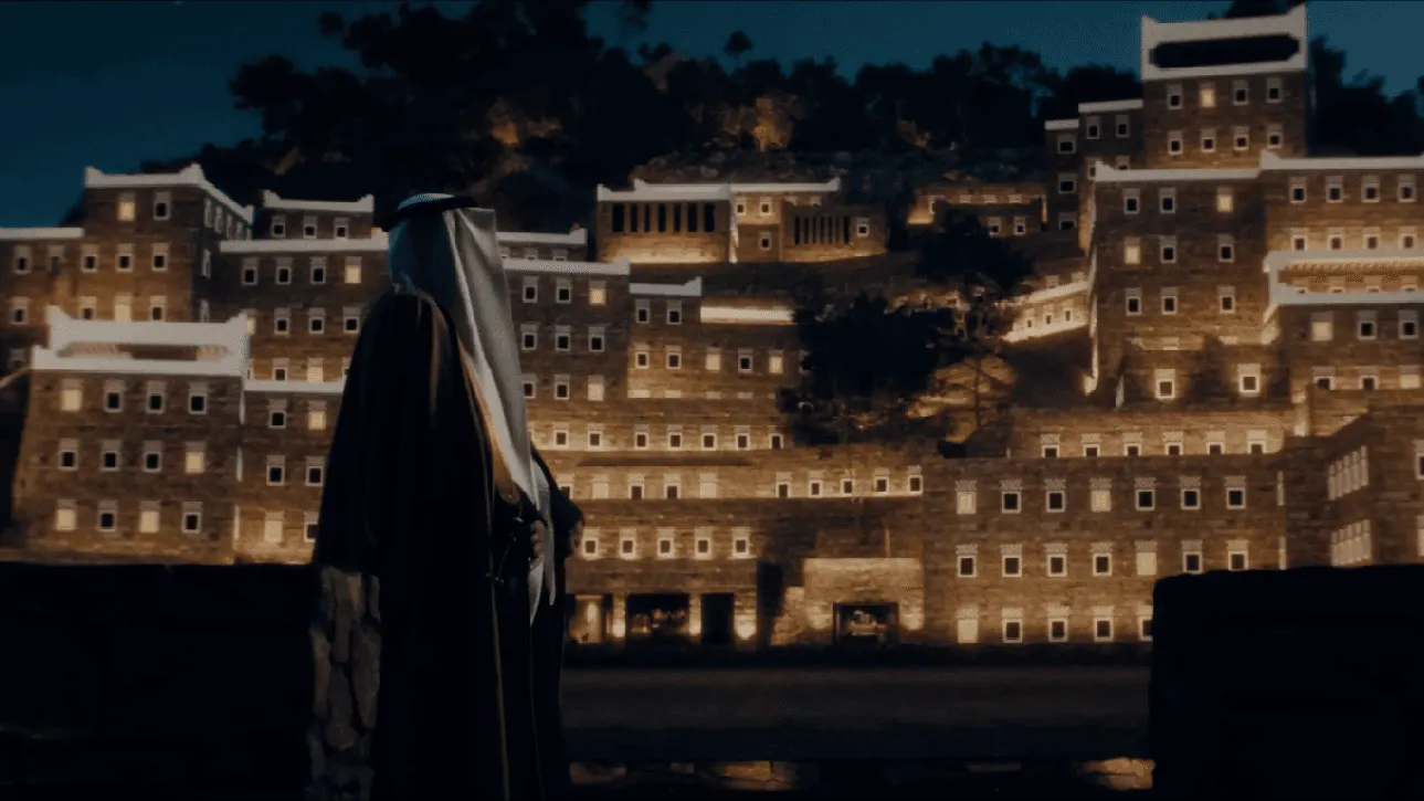 person looking at diriyah buildings